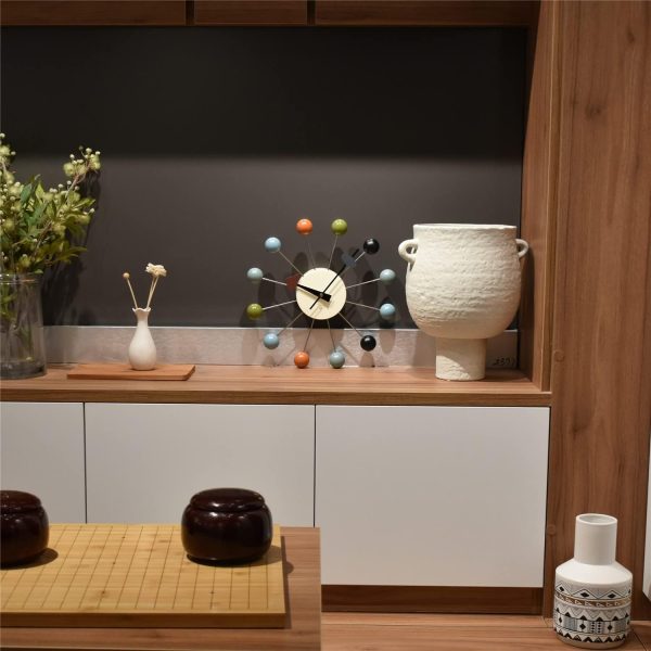 Reloj de pared de bolas